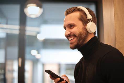 man listening with headphones