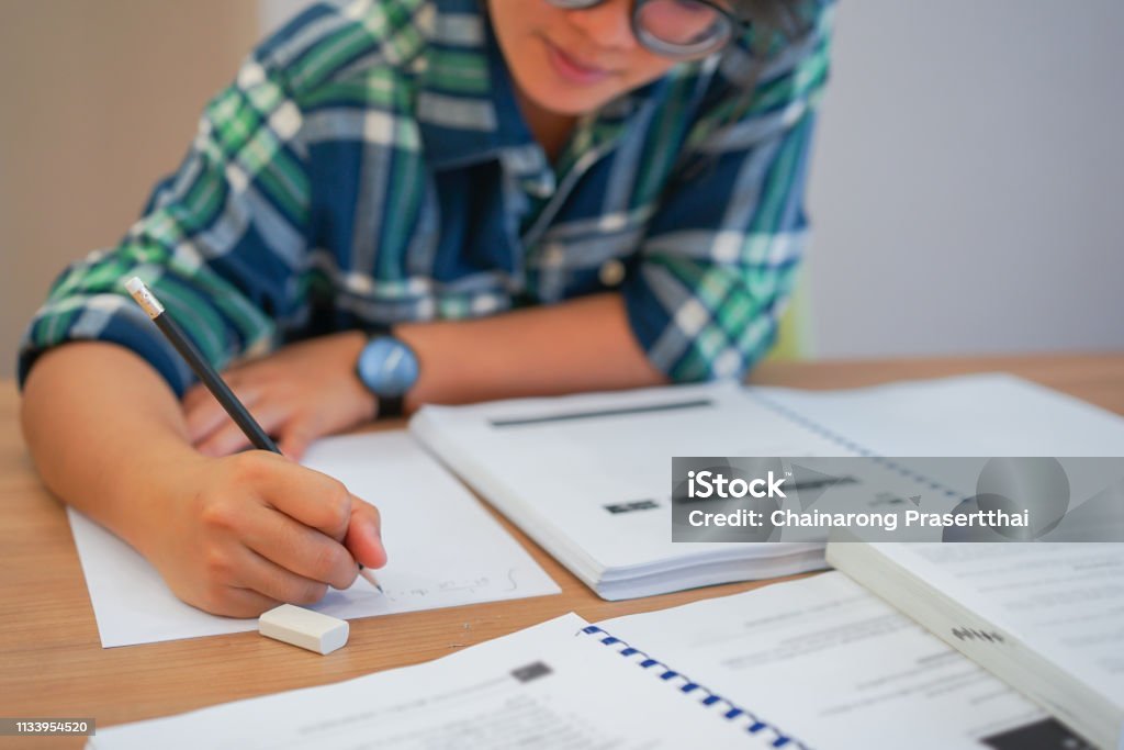 student taking notes